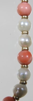 Lot 99 - A coral and cultured pearl bead necklace, with...