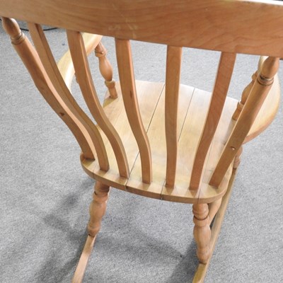 Lot 190 - A beech splat back rocking chair