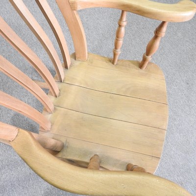 Lot 190 - A beech splat back rocking chair