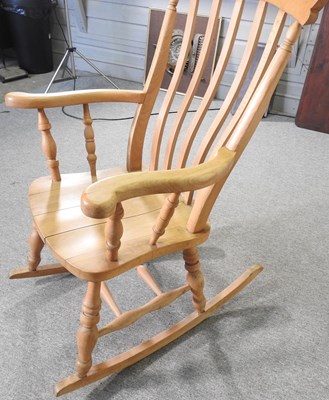 Lot 190 - A beech splat back rocking chair