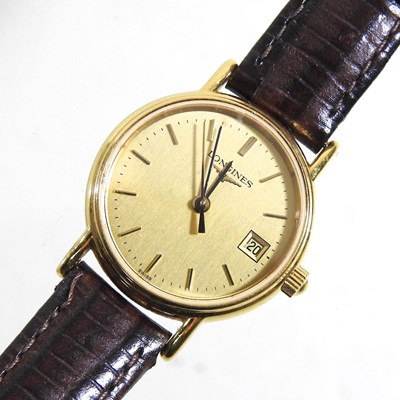 Lot 16 - A Longines ladies gold plated wristwatch, the...