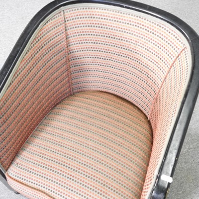 Lot 75 - An Art Deco ebonised tub shaped armchair