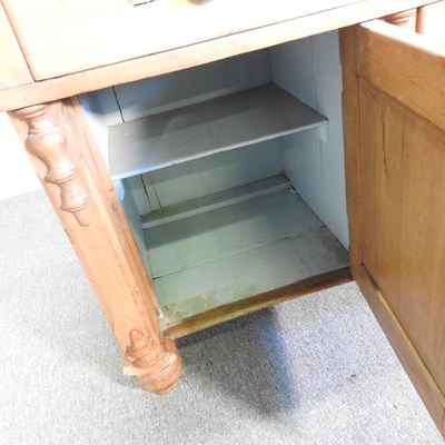 Lot 61 - An antique pine side cabinet, with three short...
