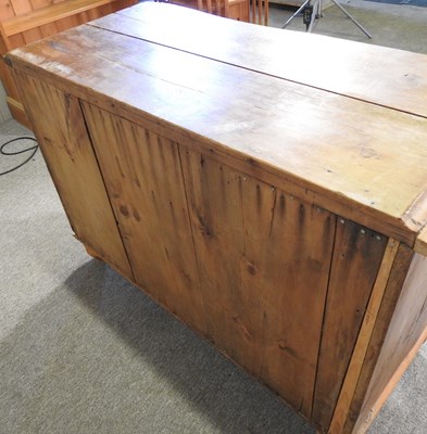 Lot 61 - An antique pine side cabinet, with three short...