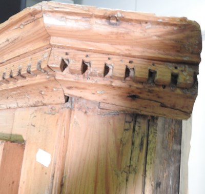 Lot 138 - An antique pine barrel back standing corner...
