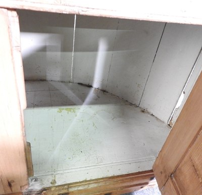 Lot 138 - An antique pine barrel back standing corner...