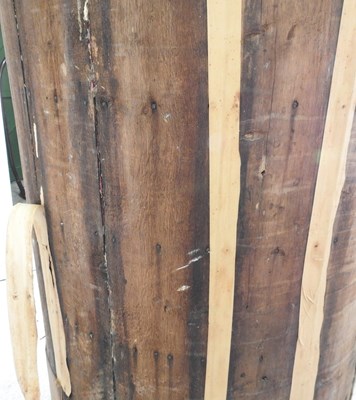 Lot 138 - An antique pine barrel back standing corner...
