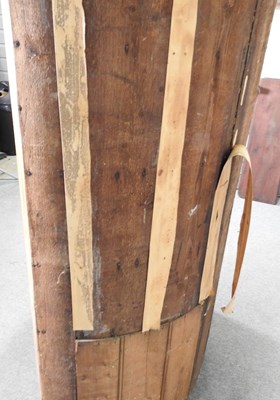 Lot 138 - An antique pine barrel back standing corner...