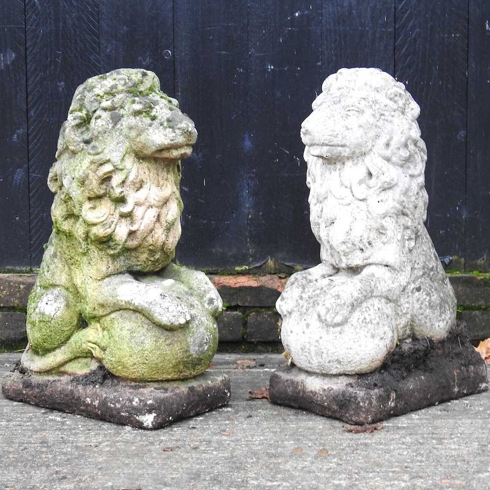 Lot 4 - A pair of reconstituted stone garden statues...