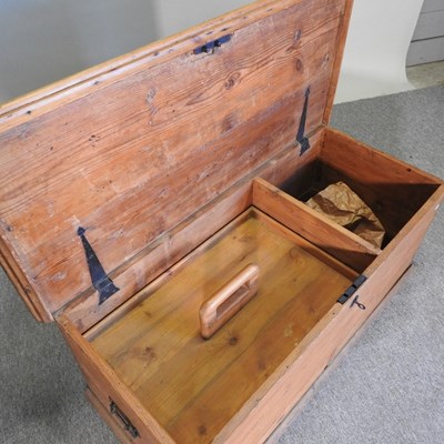 Lot 100 - An antique pine box, with a hinged lid,...