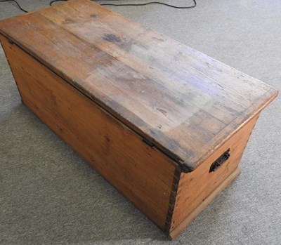 Lot 100 - An antique pine box, with a hinged lid,...