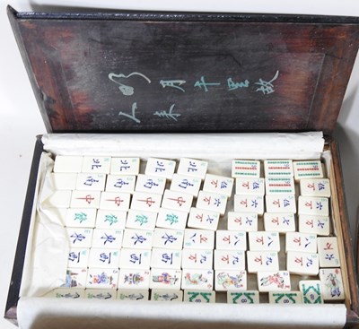 Lot 49 - A mid 20th century Mah Jong set, with bone...