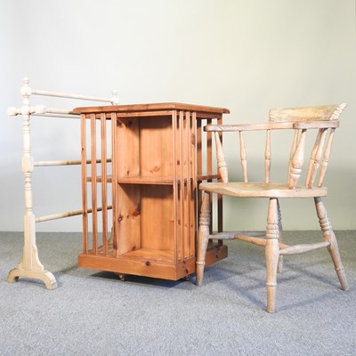 Lot 88 - A pine revolving bookcase, 55cm wide, together...