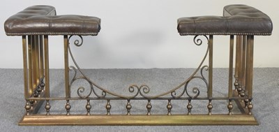 Lot 7 - A brass club fender, with a buttoned leather seat