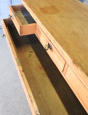 Lot 6 - An early 20th century pine chest, containing...