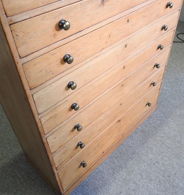 Lot 6 - An early 20th century pine chest, containing...