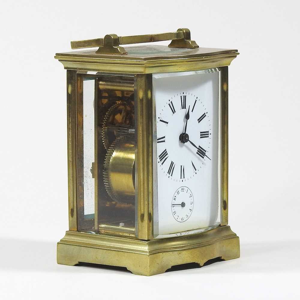 Lot 5 - An early 20th century brass cased carriage...