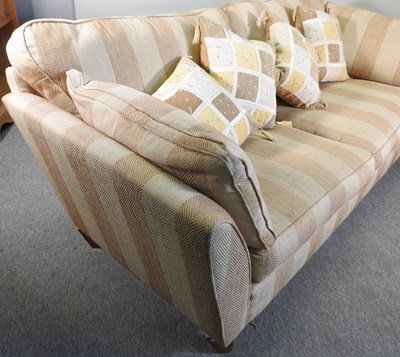 Lot 66 - A modern gold striped upholstered sofa, with...