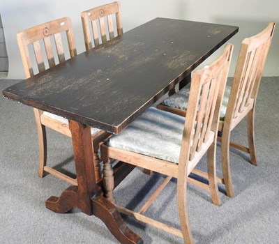 Lot 175 - An oak dining table, together with a set of...