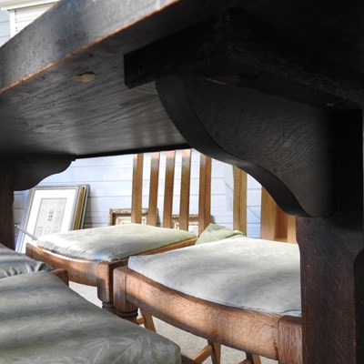 Lot 175 - An oak dining table, together with a set of...