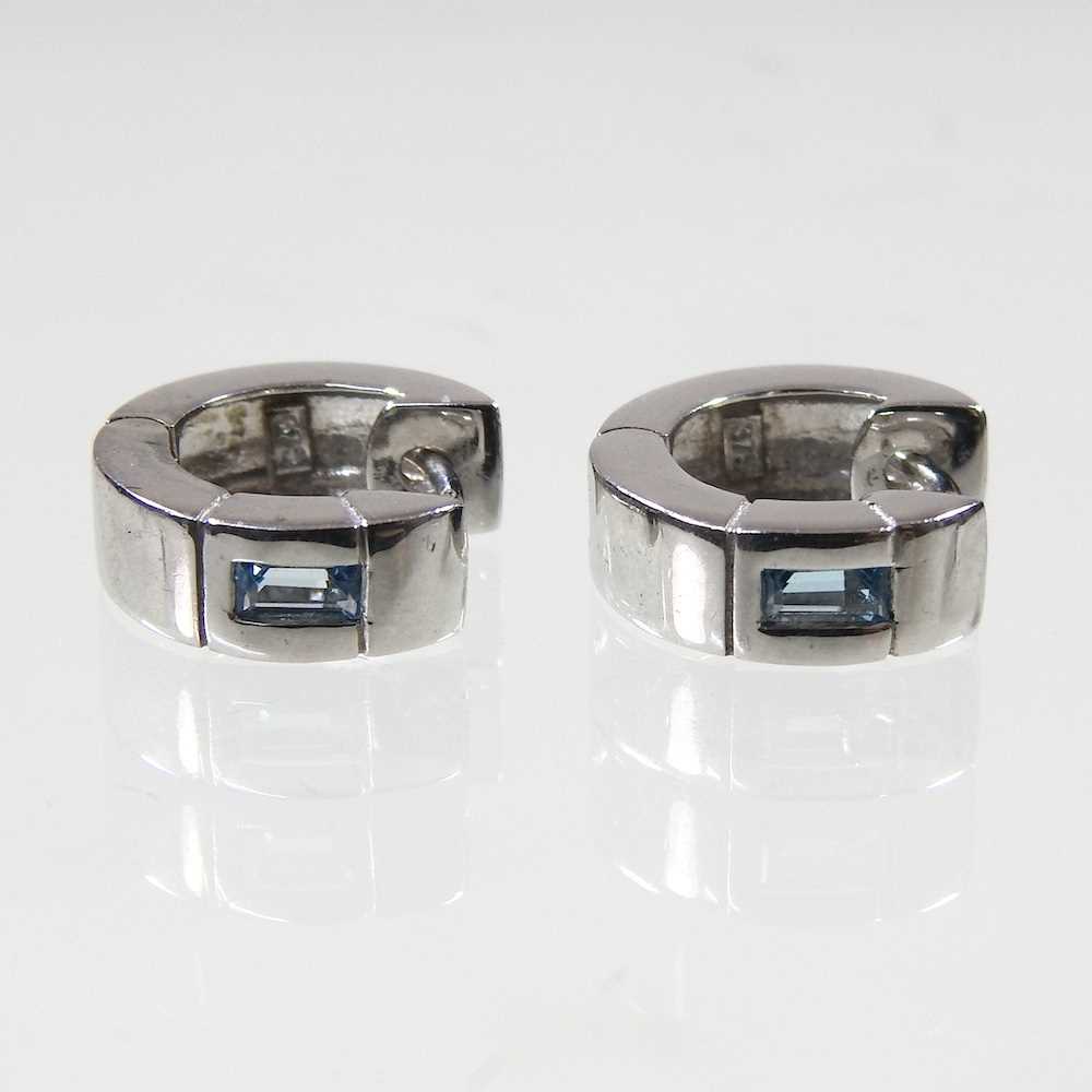 Lot 120 - A pair of 9 carat white gold and aquamarine...