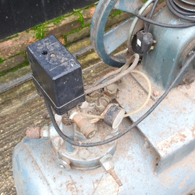 Lot 142 - An air compressor, 116cm wide