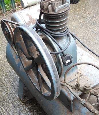 Lot 142 - An air compressor, 116cm wide