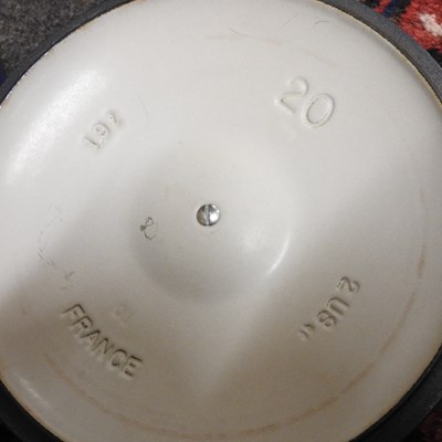 Lot 16 - A set of three graduated Le Creuset saucepans,...
