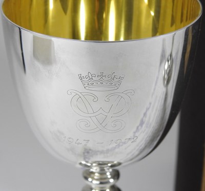 Lot 181 - A pair of Garrard silver wine goblets, to...