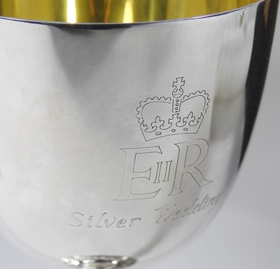 Lot 181 - A pair of Garrard silver wine goblets, to...