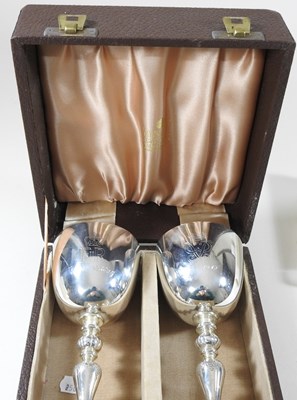 Lot 181 - A pair of Garrard silver wine goblets, to...