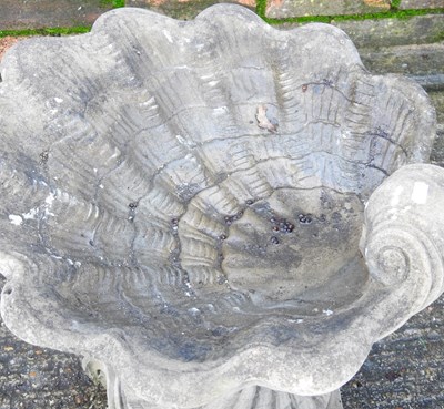 Lot 166 - A reconstituted stone garden pot, together...