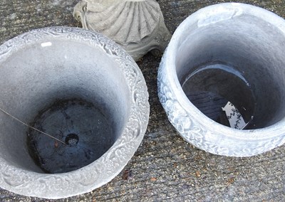 Lot 166 - A reconstituted stone garden pot, together...
