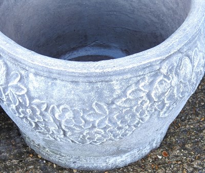 Lot 166 - A reconstituted stone garden pot, together...