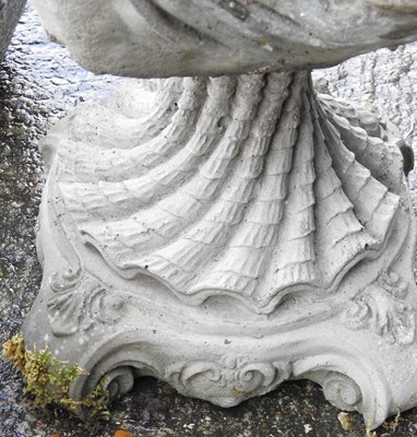 Lot 166 - A reconstituted stone garden pot, together...