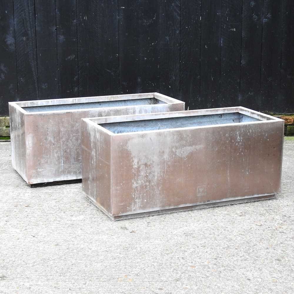 Lot 20 - A pair of copper coloured metal garden troughs...