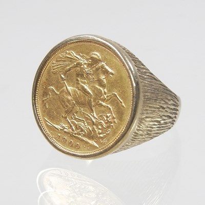 Lot 25 - A 9 carat gold ring, mounted with a Victorian...