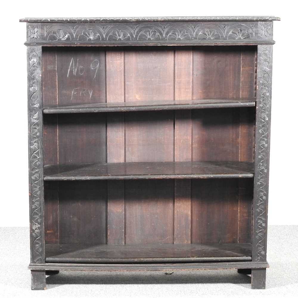 Lot 121 - An early 20th century carved oak dwarf open...