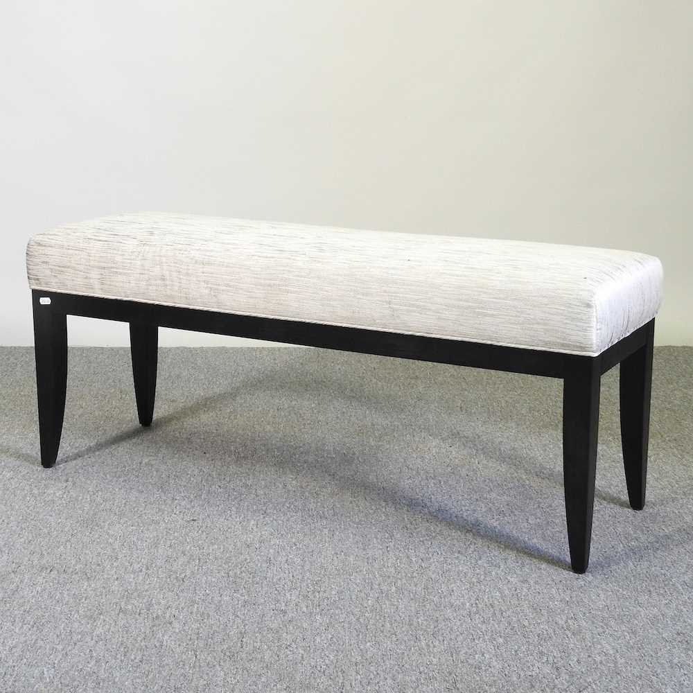 Lot 128 - A modern ebonised stool, with an upholstered seat