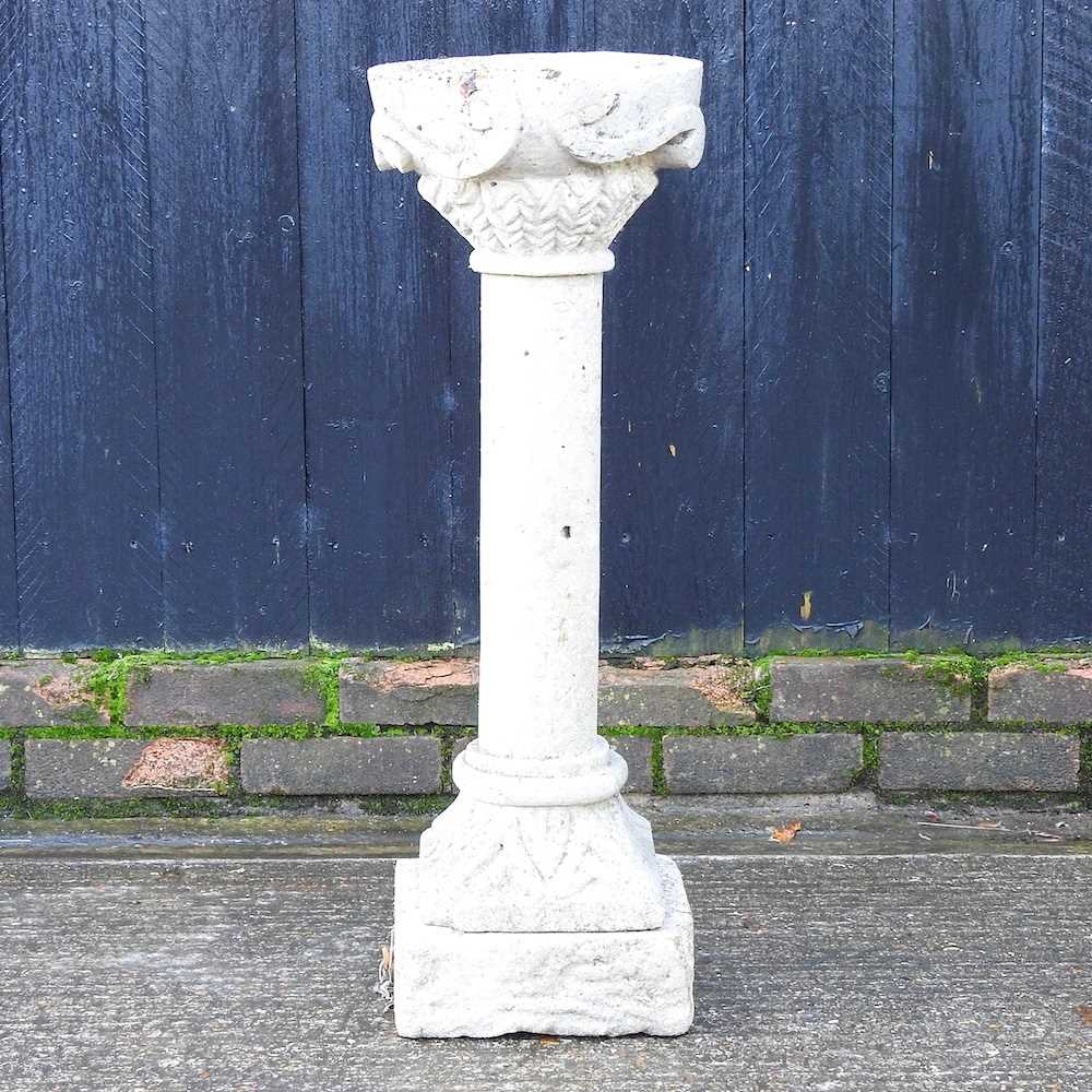 Lot 72 - A cast stone bird bath, 83cm high