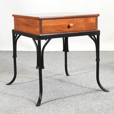 Lot 89 - A modern side table, on metal legs