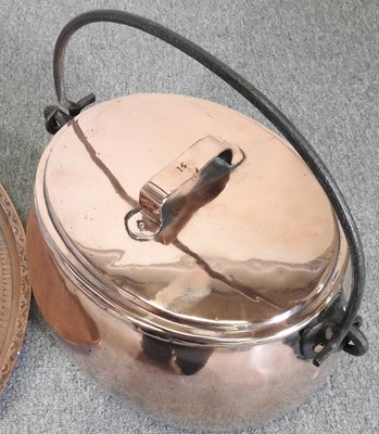 Lot 58 - A 19th century copper cauldron, with an iron...