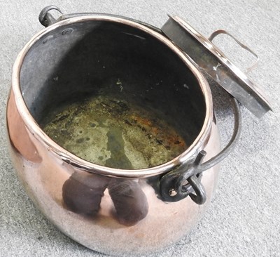 Lot 58 - A 19th century copper cauldron, with an iron...