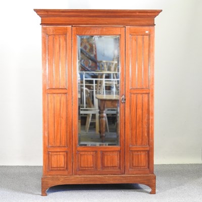 Lot 168 - An Edwardian single wardrobe, with a mirrored...