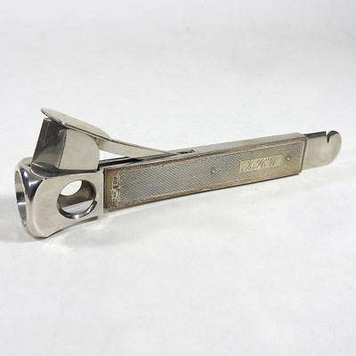 Lot 50 - A modern silver cigar cutter, with engine...