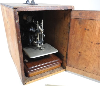 Lot 22 - A 19th century Willcox & Gibbs sewing machine,...