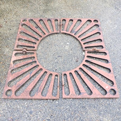 Lot 26 - A cast iron tree guard, in four sections,...