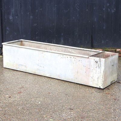 Lot 14 - A large galvanised trough, 182cm wide