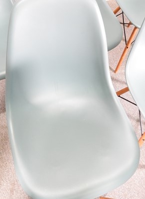Lot 10 - A set of six Vitra blue moulded plastic dining...