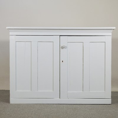 Lot 76 - A blue painted pine dresser base, on a plinth...